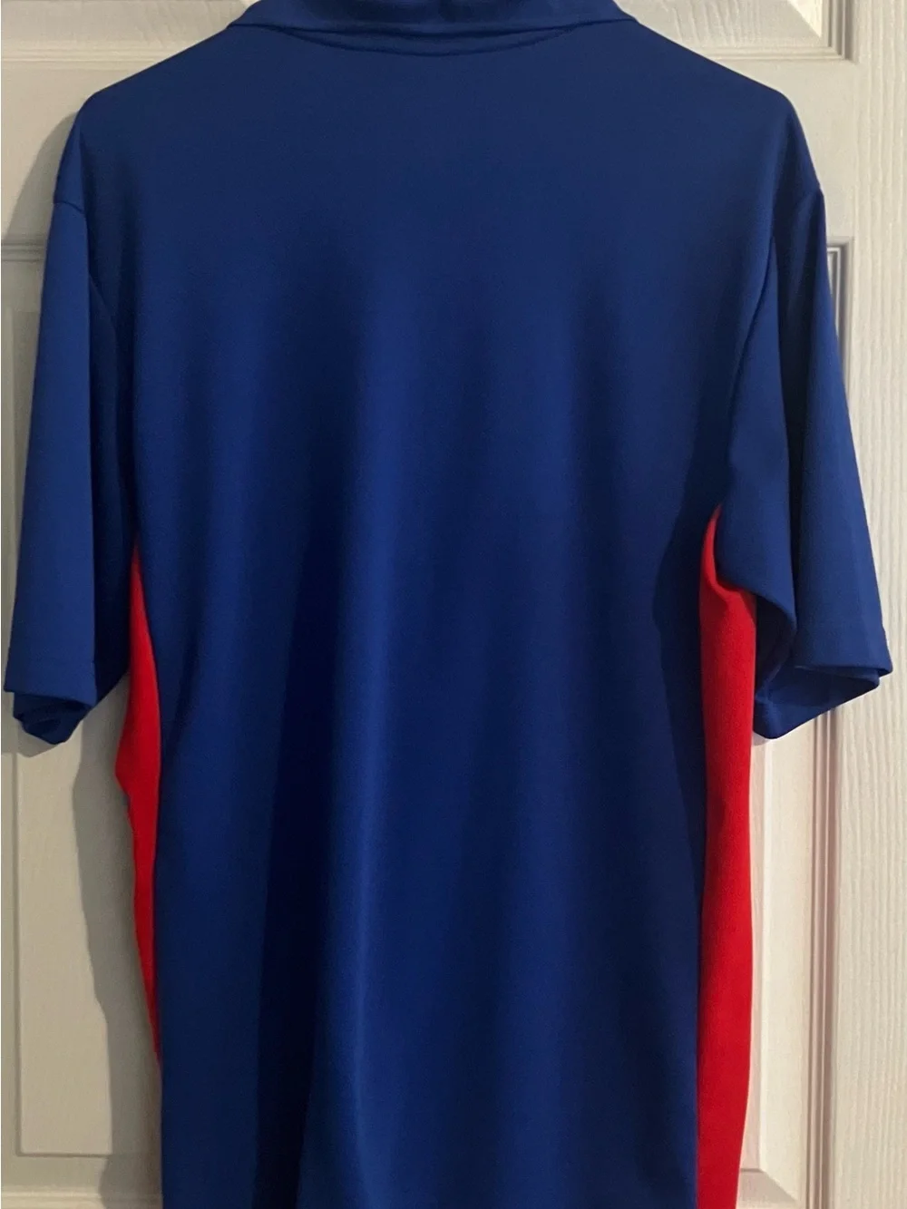 Youth New York Giant’s Royal Blue Polo with Red Side Panels Size M